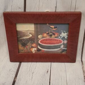 Print of 1800s painting in a wooden frame